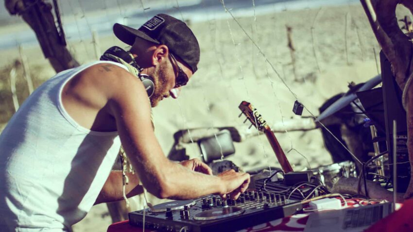 Christian Köhlert DJing at San Pedrito beach at Pura Playa